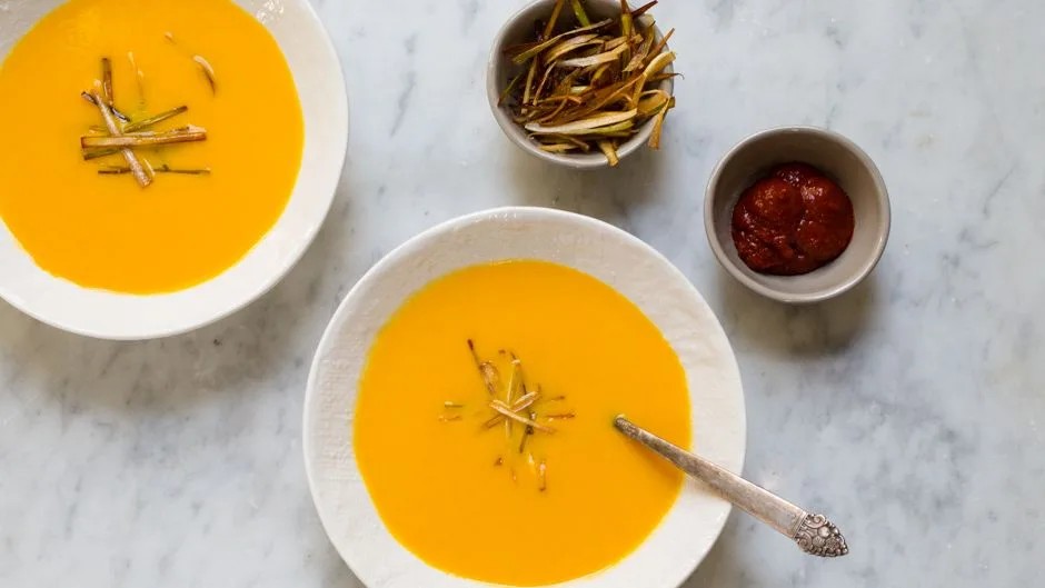Carrot-Coconut Soup with Harissa and Crispy Leeks