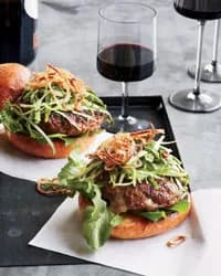 Cheddar-Stuffed Burgers with Pickled Slaw and Fried Shallots