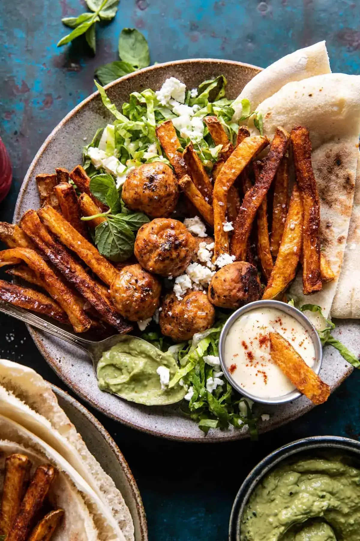 Chicken Meatball Pita Bowls with Seasoned Fries and Feta