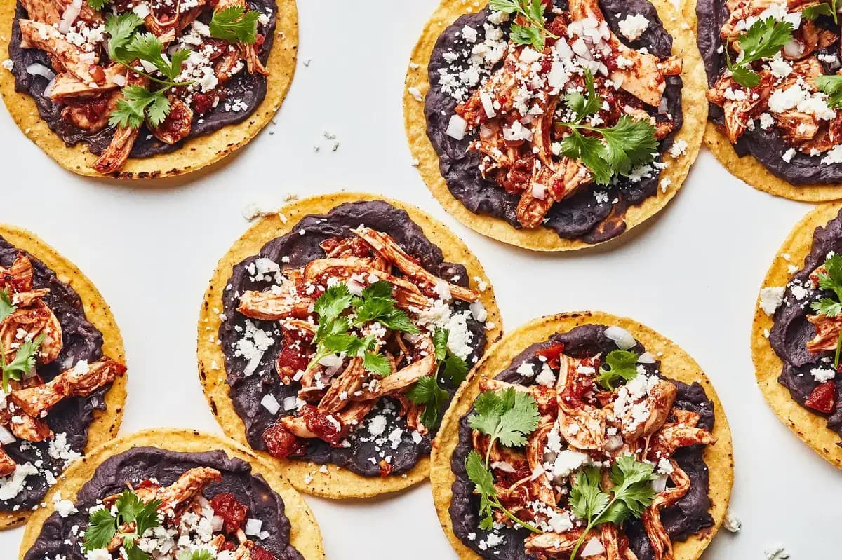 Chicken Tinga Tostadas with Bacony Black Beans