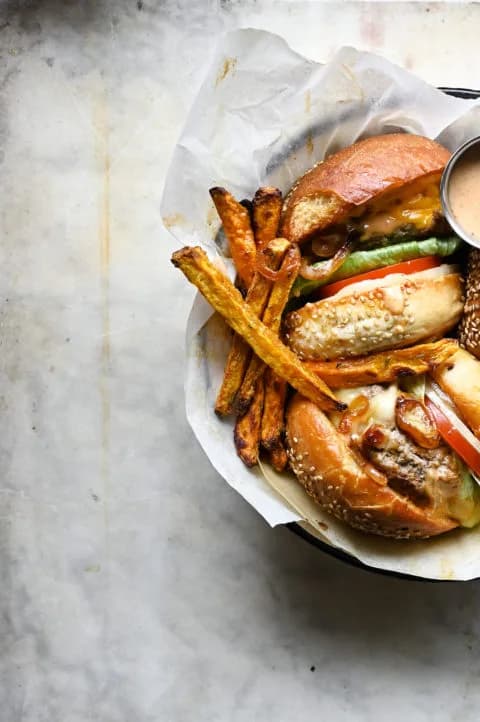 Juicy Cheeseburger with Jalapeño Sauce and Sweet Potato Fries
