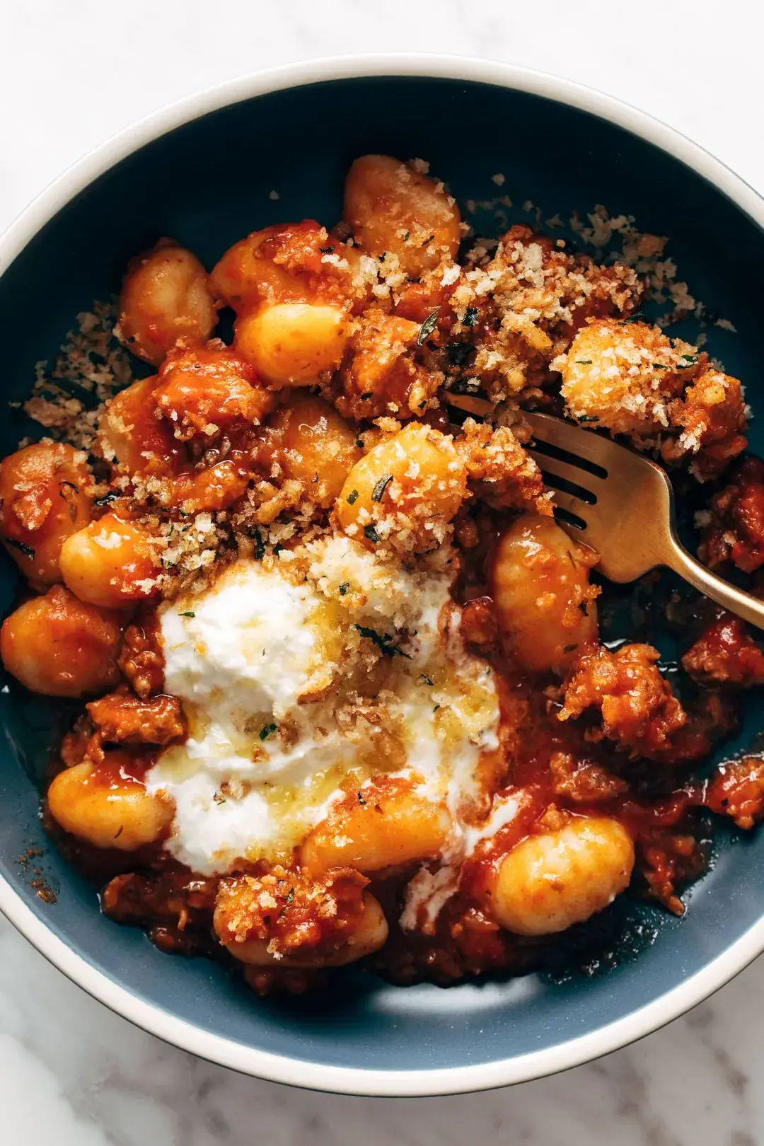 Millionaire Gnocchi with Red Sauce, Herbed Ricotta, and Golden Crispies
