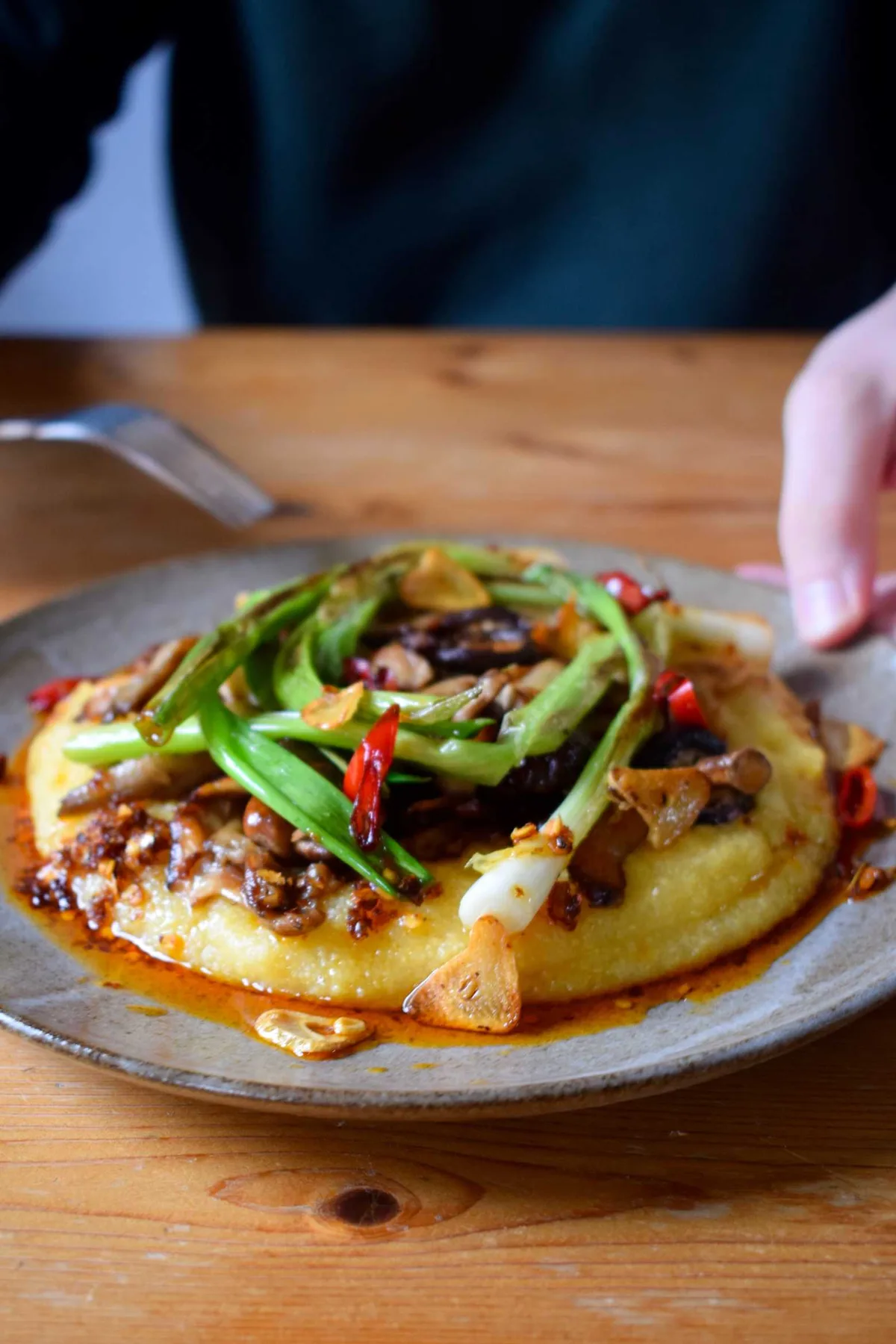 Miso Polenta Topped with Soy Mirin Mushrooms and Charred Spring Onions