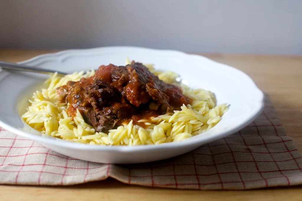 Oven-Braised Beef with Tomatoes and Garlic