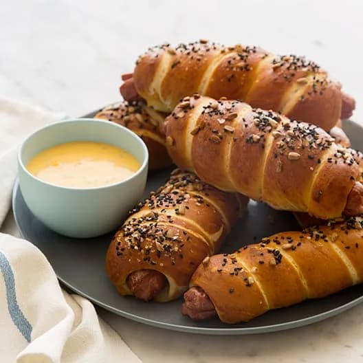 Pretzel Dogs with a Cheese Sauce