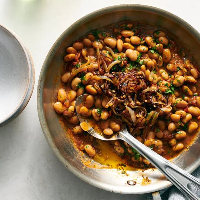 Rosemary White Beans with Frizzled Onions and Tomato