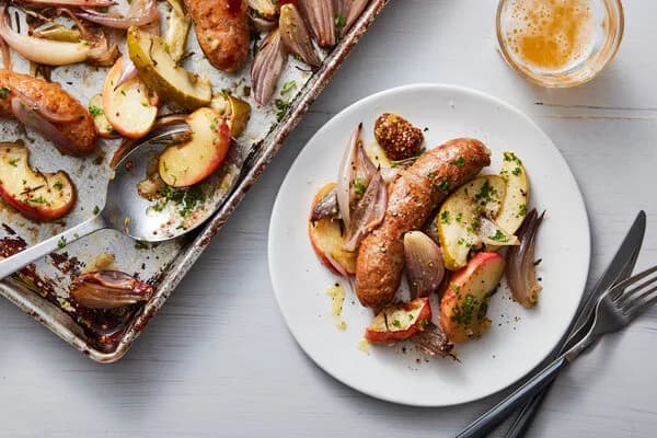 Sheet-Pan Sausages with Caramelized Shallots and Apples