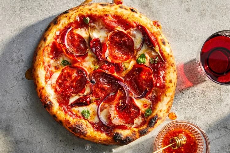 Soppressata Pizza with Calabrian Chiles and Hot Honey