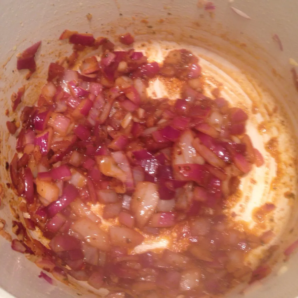 Spices simmering in garlic and onions